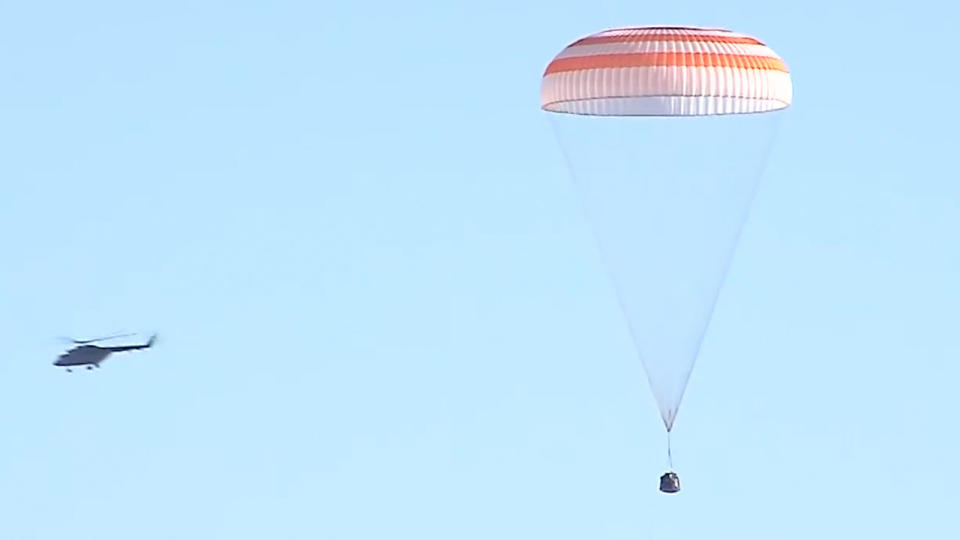 The Russian Soyuz MS-22 space capsule descends under its main parachute as it lands on the steppes of Kazakhstan on March 28, 2023.