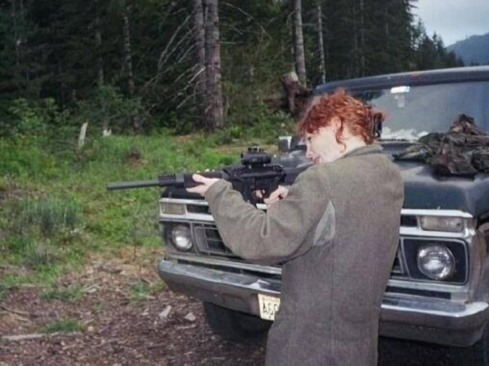 One of Ní Fhlannagáin’ patients, who has since died, practising with a rifle near the clinic (Eilís Ní Fhlannagáin)