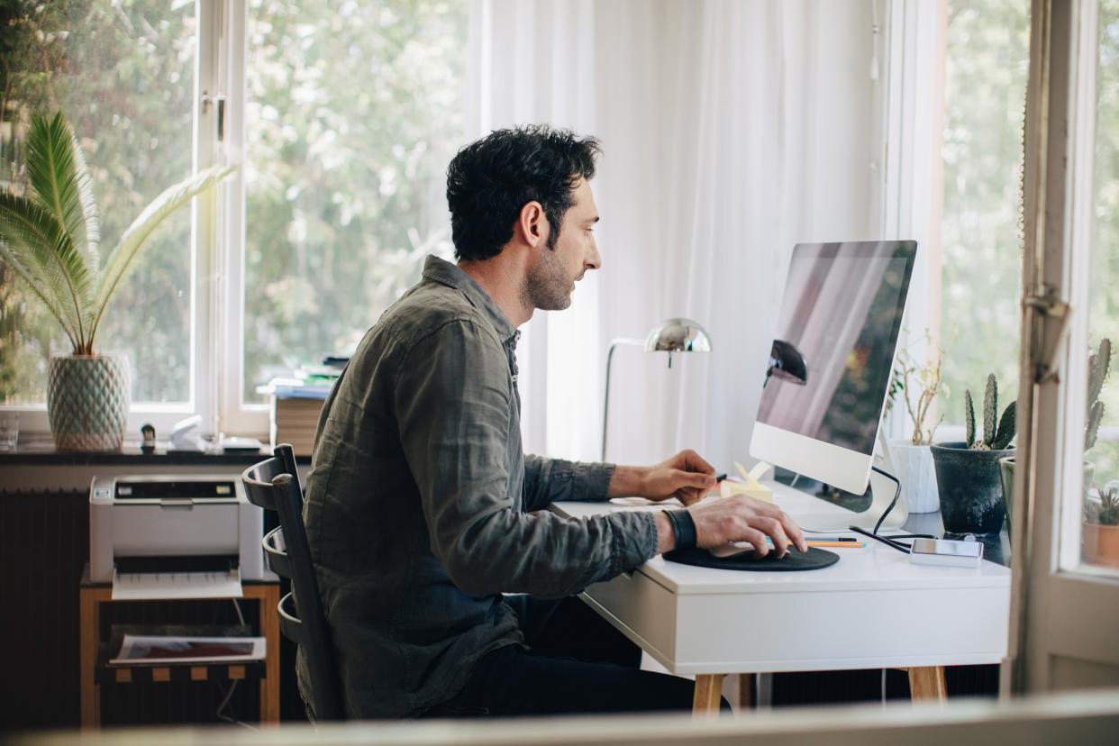 If working from home is blurring the line between work and personal life, it might be a good idea to re-evaluate your workspace. (Getty Images)