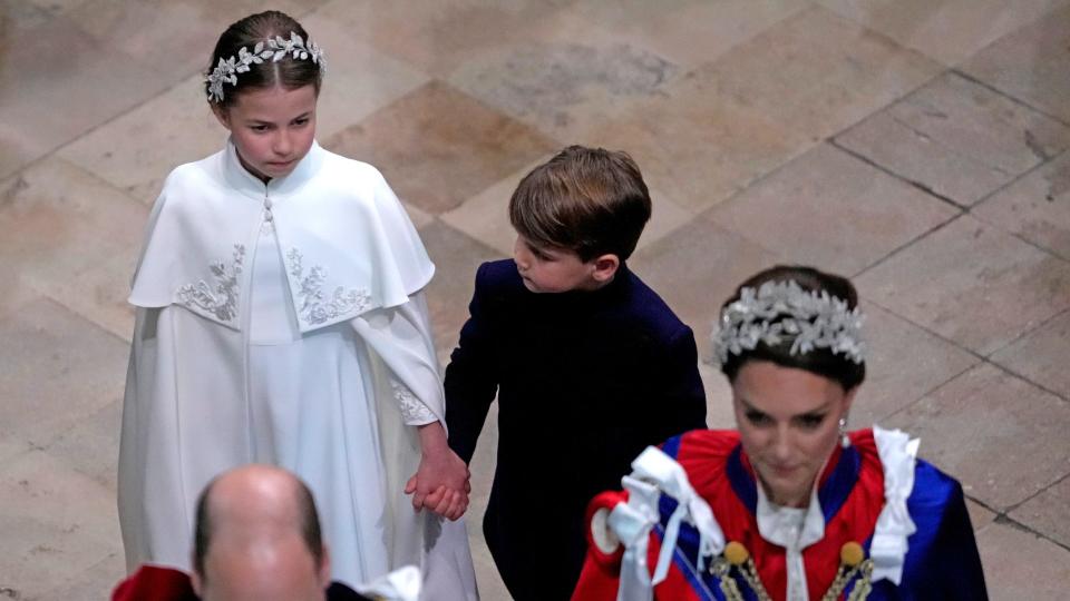 Charlotte and Louis hold hands