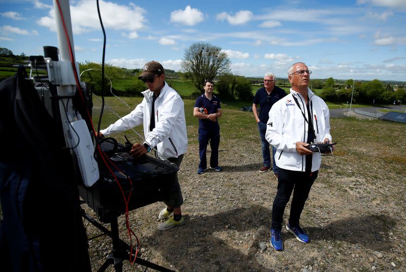 Drone operators from Manna Aero fly the drone as essential household and medical supplies are delivered to the Irish village of Moneygall