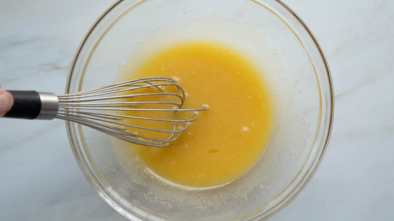 hand whisking egg