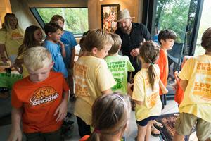 Zac Brown greets some of Camp Southern Ground's first summer campers.