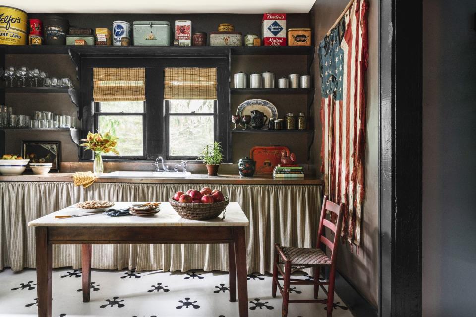 dark farmhouse kitchen with black wood shelves