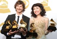 Gotye and Kimbra pose in the press room with their trophies at the Staples Center during the 55th Grammy Awards in Los Angeles, California, on February 10, 2013