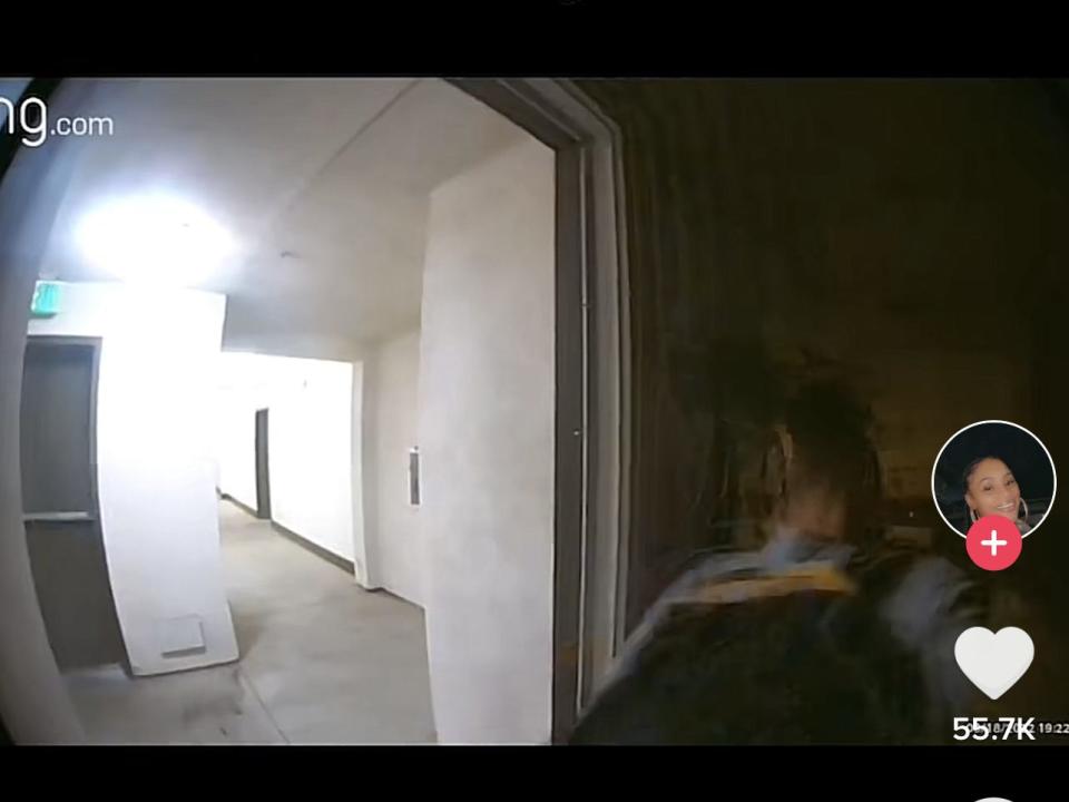 ring doorbell footage of woman entering her home