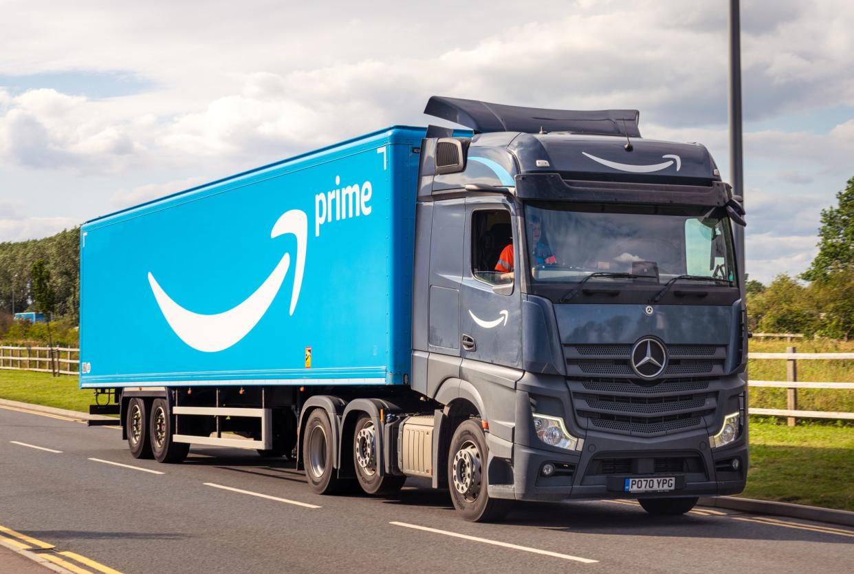 Milton Keynes, UK - A large Amazon Prime delivery lorry on the road.