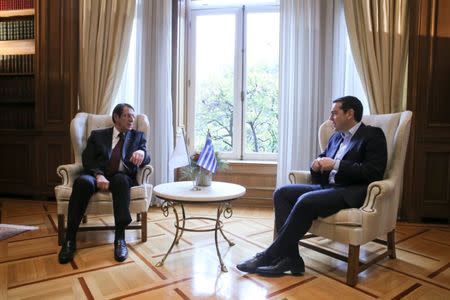 Greek Prime Minister Alexis Tsipras meets with Cypriot President Nicos Anastasiades at the Maximos Mansion in Athens, Greece December 30, 2016. REUTERS/Alkis Konstantinidis