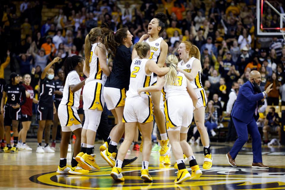 Missouri celebrates its upset of top-ranked South Carolina.