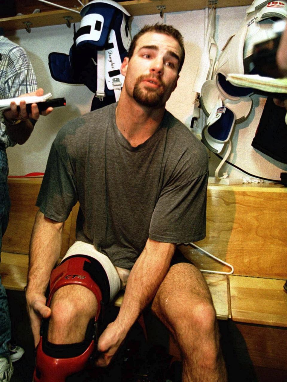 Philadelphia Flyers' Eric Lindros sits after practice Tuesday, May 27, 1997, at the team's practice rink in Voorhees, N.J.