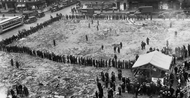 Jobless Americans stand in line for a free meal in New York in 1930. On January 6, 1931, as the Great Depression was getting underway, a report to U.S. President Herbert Hoover estimated that 4 million to 5 million Americans were out of work. UPI File Photo