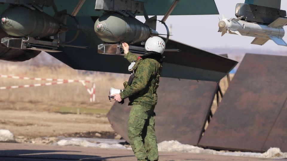 Final checks on bombs before flight of the crew of Su-34 Fighter Bomber on March 8. - Russian Defense Ministry/Handout/Anadolu via Getty Images