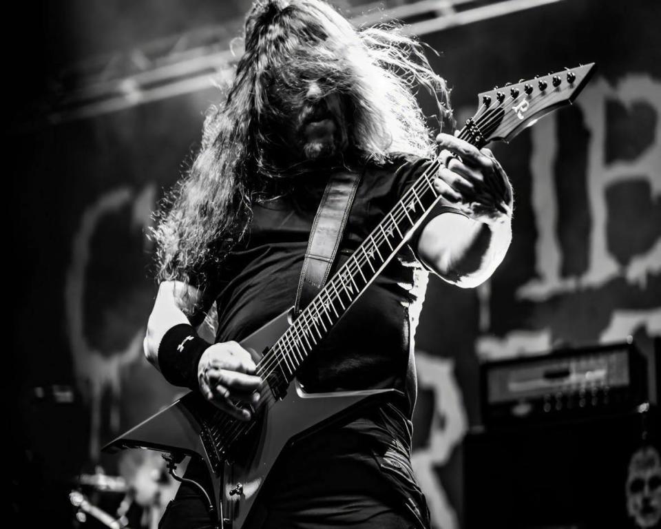 Canton-based photographer Josh Harris enjoys taking black-and-white photos of rock concerts, including this image of guitarist Erik Rutan of Cannibal Corpse.