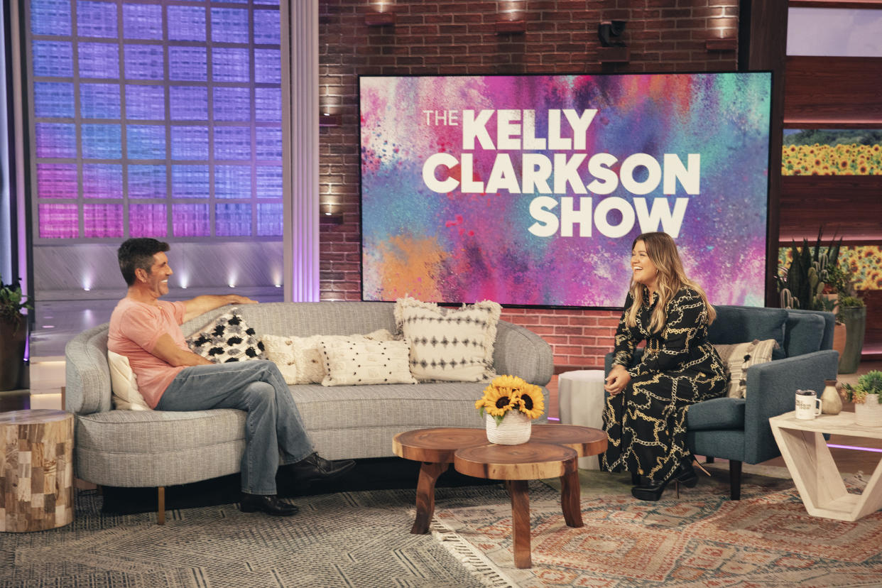 THE KELLY CLARKSON SHOW -- Episode 4174 -- Pictured: (l-r) Simon Cowell, Kelly Clarkson -- (Photo by: Weiss Eubanks/NBCUniversal/NBCU Photo Bank via Getty Images)