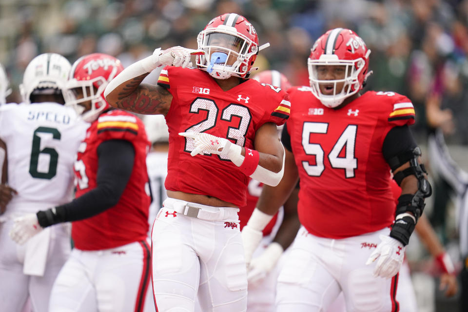 Maryland running back Colby McDonald (23) reacts after scoring a touchdown against Michigan State during the first half of an NCAA college football game, Saturday, Oct. 1, 2022, in College Park, Md. (AP Photo/Julio Cortez)