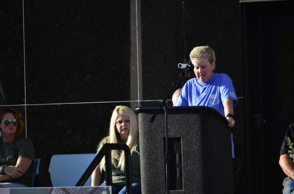 Seara Burton's stepmother, 28-year Richmond Police Department veteran and Sergent Ami Miller, speaks to the crowd in attendance at Burton's prayer vigil in front of the Richmond Municipal Building Sept. 8, 2023, nearly a year after her death.