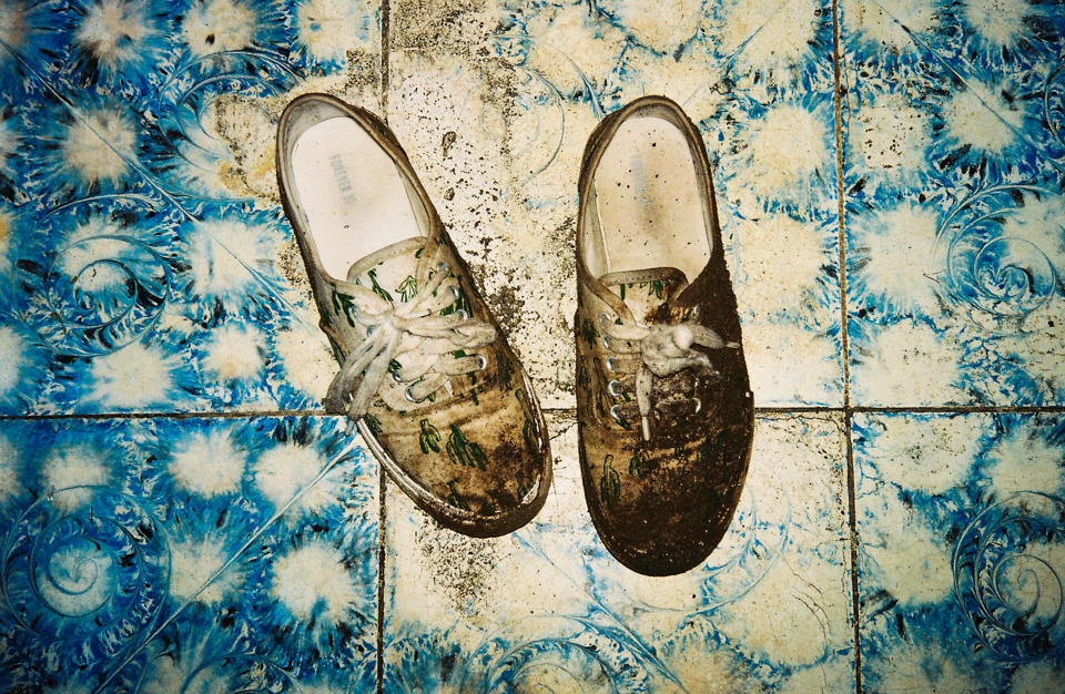 June 27, 2016 - Muddy shoes after crossing the border into Honduras atnight. (Photo: Lisette Poole)