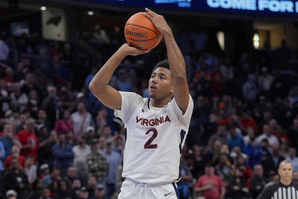 Virginia guard Reece Beekman (2) shoots and misses both during the second half of an NCAA college basketball game against North Carolina State in the semifinal round of the Atlantic Coast Conference tournament Friday, March 15, 2024, in Washington. North Carolina State won 73-65 in overtime and advanced to the championship. (AP Photo/Susan Walsh)