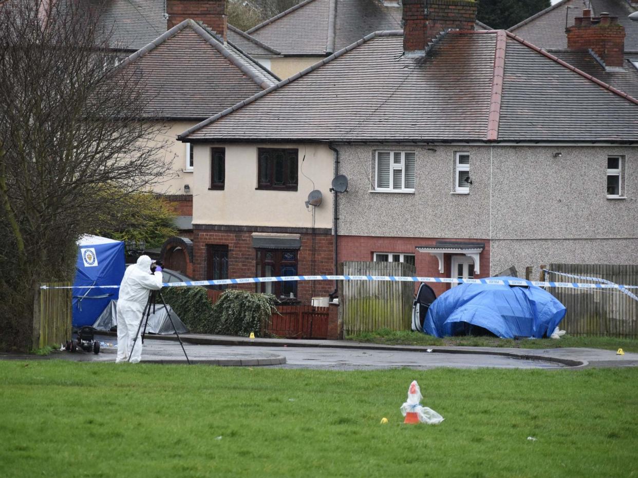 Police at the scene of a double murder in Pensnett Road, Brierley Hill, West Midlands, where two men were stabbed to death during a suspected robbery at a cannabis factory, 20 February 2020: Matthew Cooper/PA