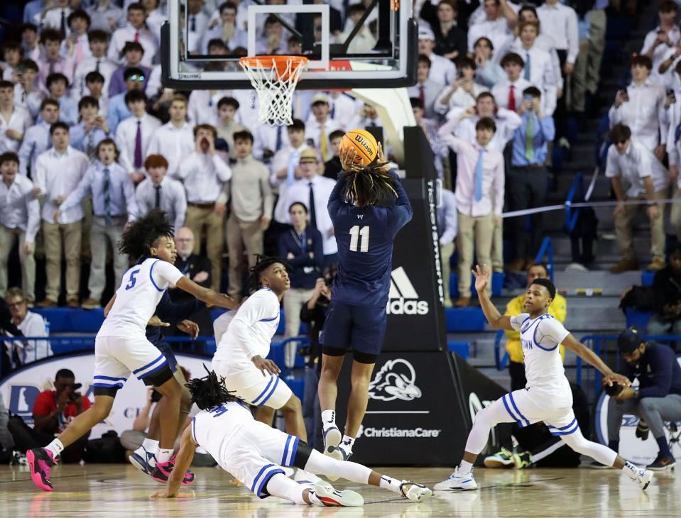 Salesianum's Isaiah Hynson sinks a jumper with 4 seconds to play to lift the Sals to a 51-49 win in a DIAA state tournament semifinal at the Bob Carpenter Center, Thursday, March 9, 2023.