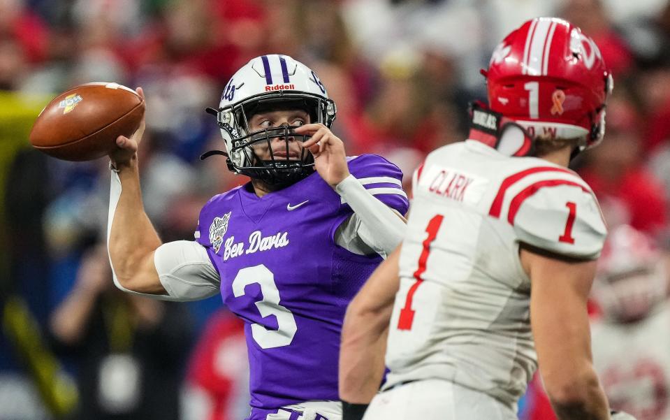 Ben Davis Giants quarterback Thomas Gotkowski (3) searches to throw the ball Saturday, Nov. 25, 2023, during the IHSAA Class 6A football state championship game at Lucas Oil Stadium in Indianapolis. The Ben Davis Giants defeated the Crown Point Bulldogs, 38-10.