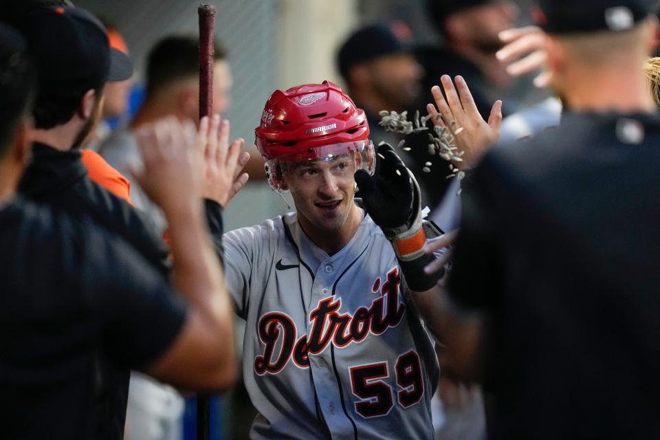 Detroit Tigers' Zack Short (59) celebrates in the dugout after hitting a home run during the second inning against the Los Angeles Angels at Angel Stadium in Anaheim, California, on Saturday, Sept. 16, 2023.