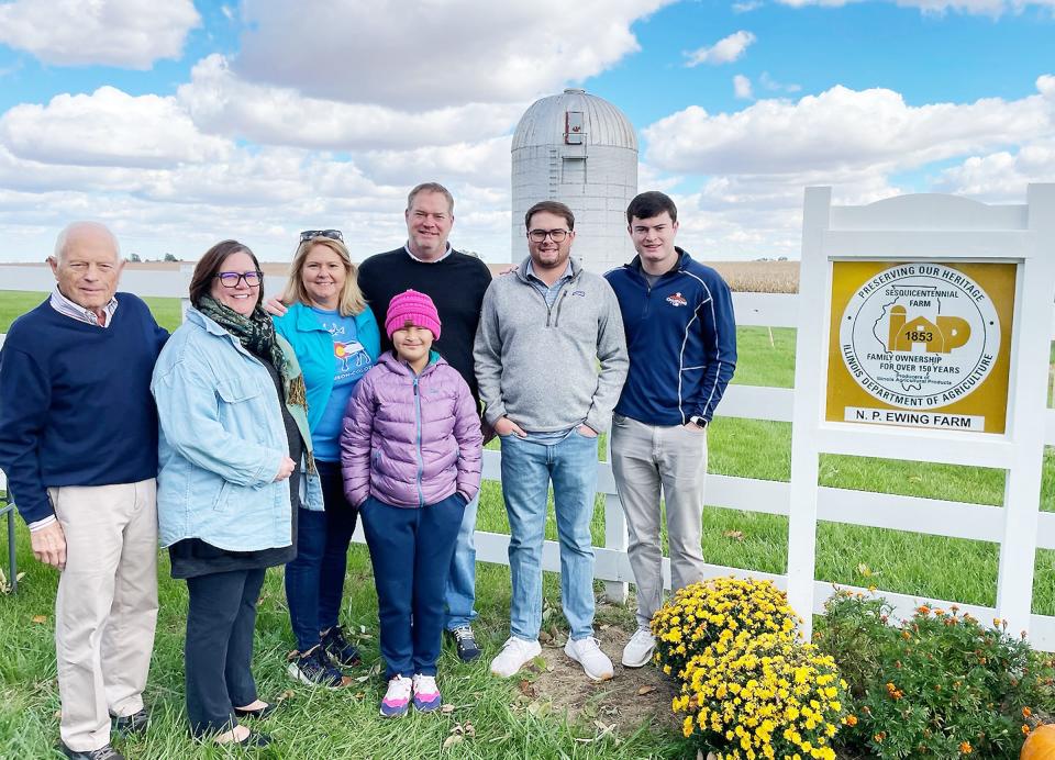 The N.P. Ewing Family Farm near McLean was recently designated as a Sesquicentennial Farm by Illinois Department of Agriculture. Among those attending the ceremony on Oct. 7 were, from left, Tom Ewing, daughter Jane Ewing, daughter Kate Ewing, granddaughter Lucy Ewing (Jane's daughter), son Sam Ewing, grandson Thomas Ewing and grandson Porter Ewing.