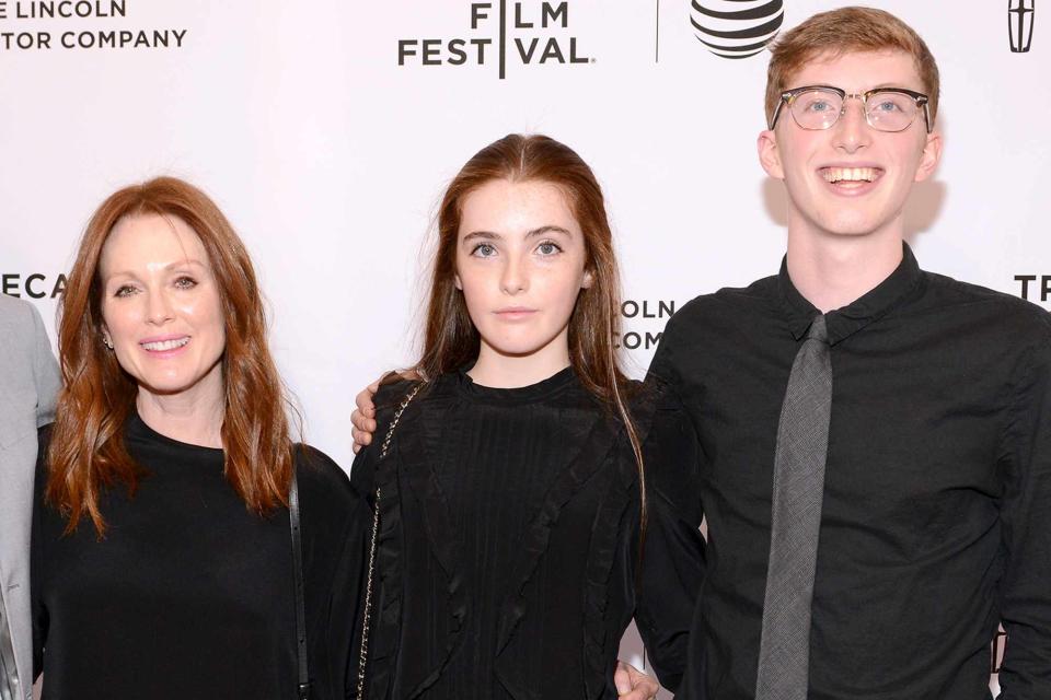 <p>Noam Galai/Getty</p> Julianne Moore, Liv Freundlich, and Caleb Freundlich attend the "Wolves" Premiere during the 2016 Tribeca Film Festival on April 15, 2016 in New York City.  