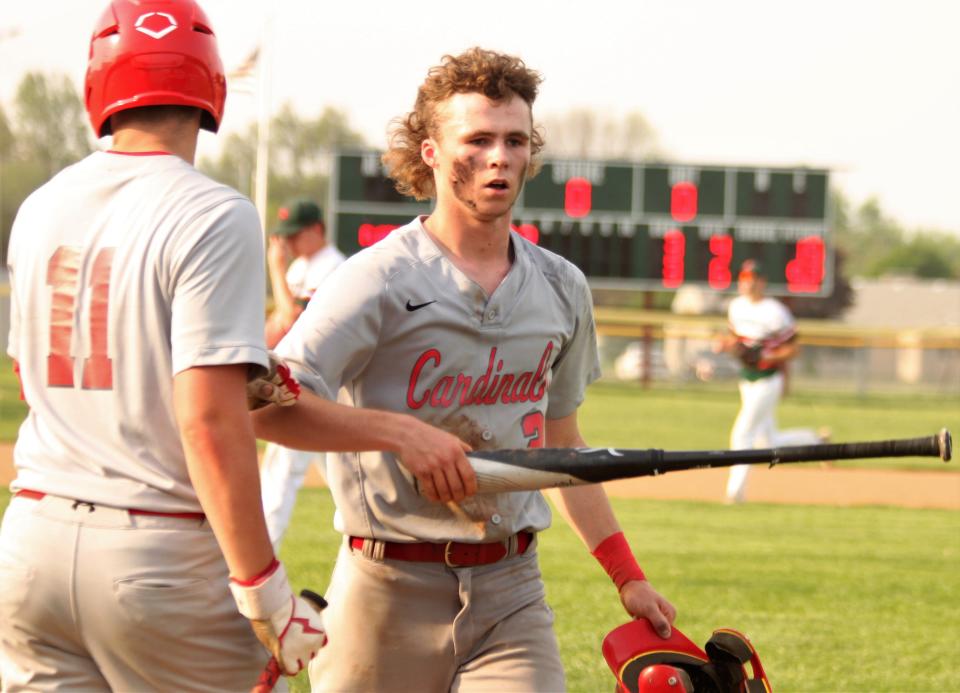 Pleasant Plains senior outfielder Cannon Greer heads to the dugout during a nonconference game against Lincoln at Mike Curry Field on Wednesday, May 11.