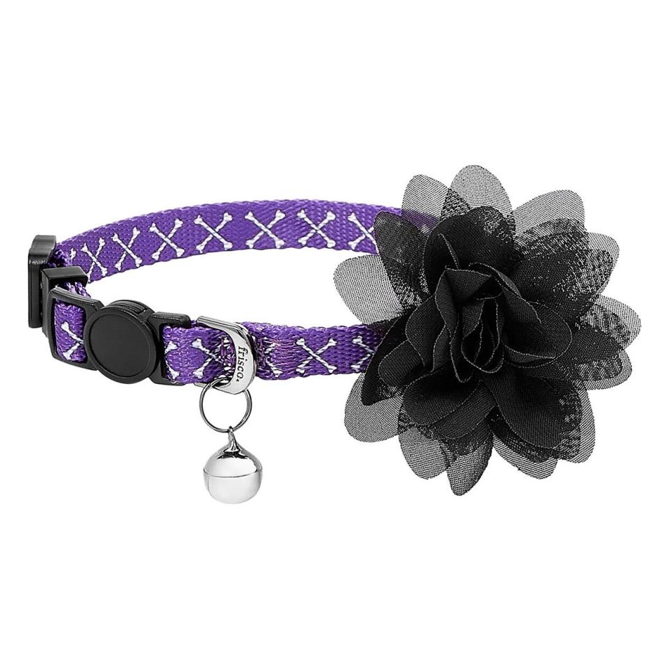 Frisco Crossbones Cat Collar with Black Flower on a white background