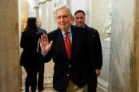 Senate Majority Leader McConnell departs after the Trump impeachment trial ended for the day in Washington.