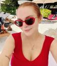 <p><strong>Location:</strong> Maldives</p> <p>Lindsay Lohan sported all red while <a href="https://www.instagram.com/p/CNxUHBaBtAl/" rel="nofollow noopener" target="_blank" data-ylk="slk:sitting beachside;elm:context_link;itc:0;sec:content-canvas" class="link ">sitting beachside</a> at the <a href="https://www.marriott.com/en-us/hotels/mlewh-w-maldives/overview/" rel="nofollow noopener" target="_blank" data-ylk="slk:W Maldives;elm:context_link;itc:0;sec:content-canvas" class="link ">W Maldives</a> resort. The five-star private island features infinity pools, reefs, turquoise waters and overwater bungalows.</p>