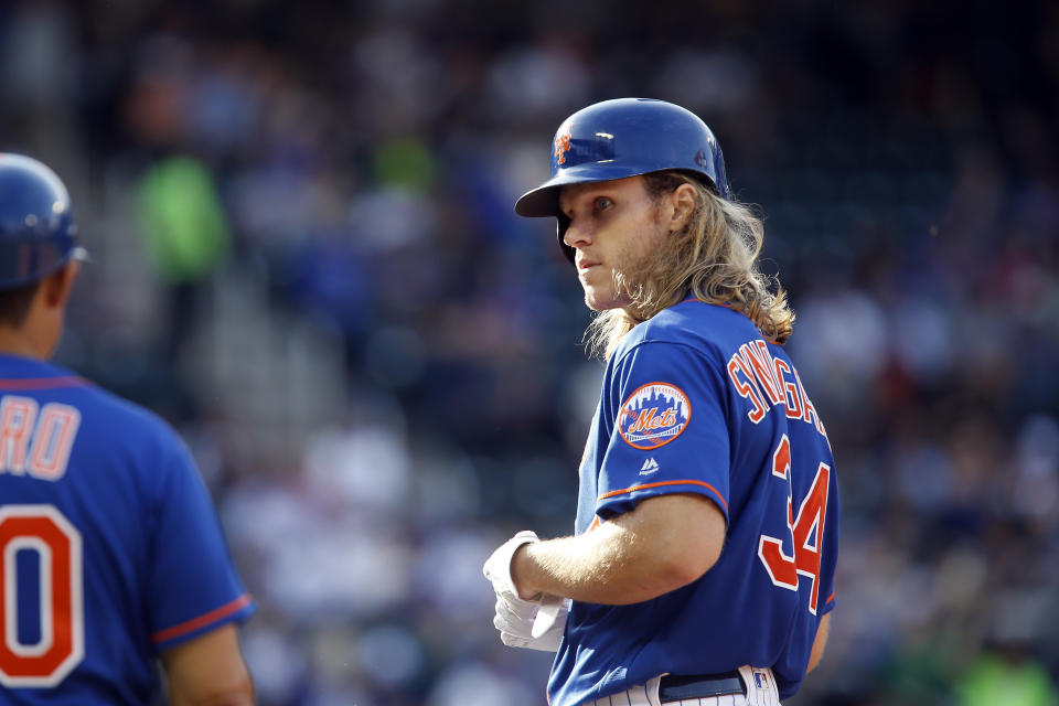 New York Mets' pitcher Noah Syndergaard is firmly against a universal designated hitter rule taking away his at-bats. (AP)