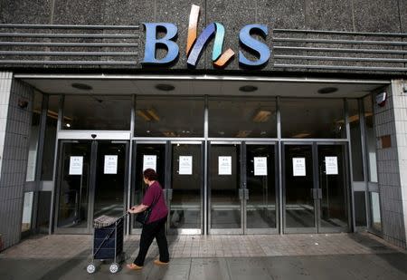 FILE PHOTO: A woman walks past the Wood Green branch of department store chain BHS, in London, August 28, 2016. REUTERS/Peter Nicholls/File Photo