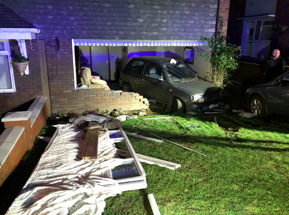 <em>A Nissan Micra ploughed into a house after it was reversed at speed following a mass brawl on New Year’s Eve (SWNS)</em>