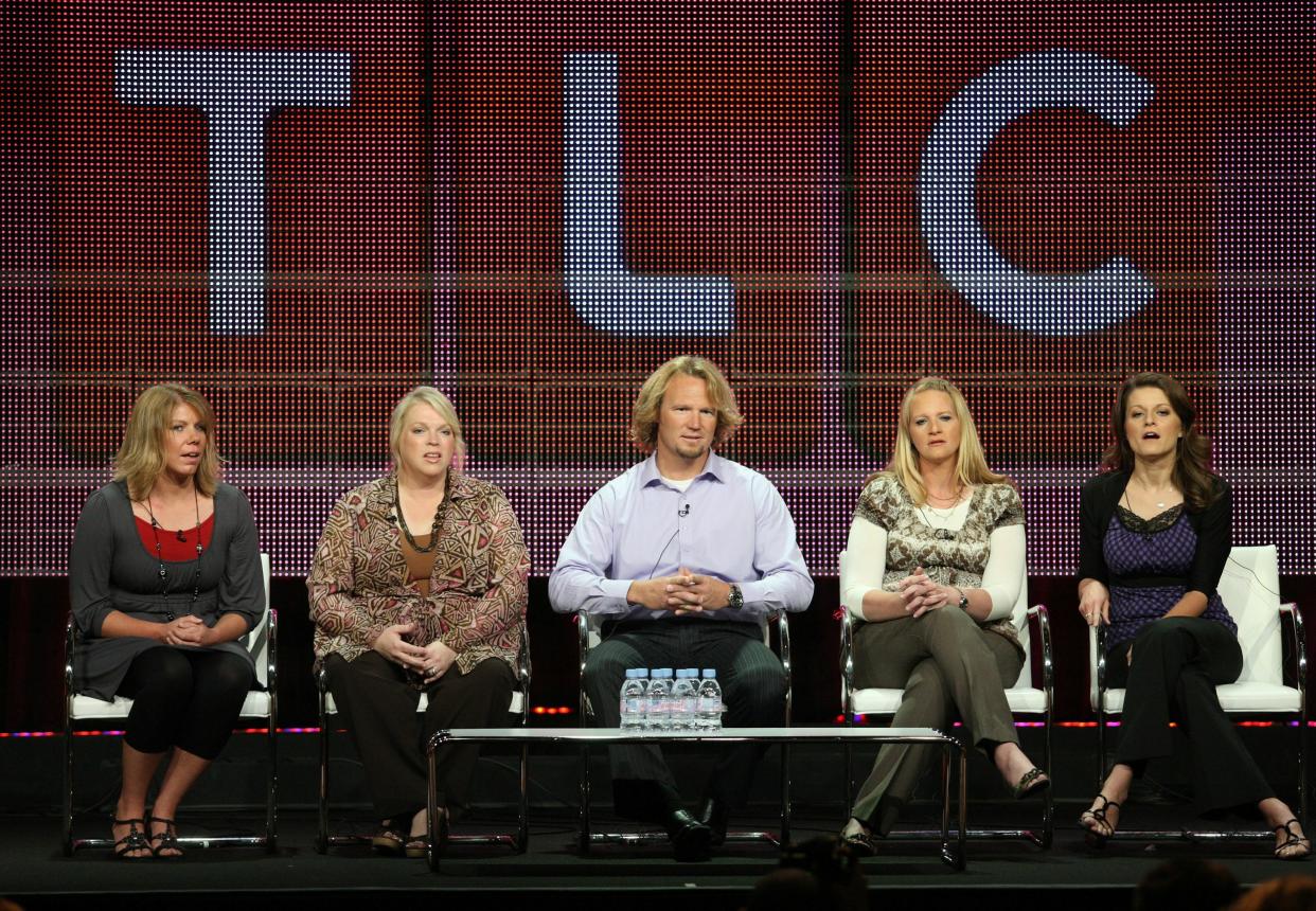 TV personalities Meri Brown, from left, Janelle Brown, Kody Brown, Christine Brown and Robyn Brown speak during the "Sister Wives" panel during the Discovery Communications portion of the 2010 Summer TCA press tour at the Beverly Hilton Hotel in Beverly Hills, California, on Aug. 6, 2010. The cause of death for "Sister Wives" alum Garrison Brown (not pictured), who died in March at the age of 25, has been revealed in a new autopsy report.