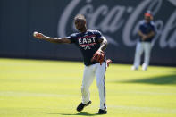 Atlanta Braves second baseman Ozzie Albies throws a ball during a workout ahead of baseballs National League Championship Series against the Los Angeles Dodgers, Friday, Oct. 15, 2021, in Atlanta. (AP Photo/John Bazemore)