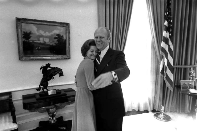 Former first lady Betty Ford, seen with President Gerald Ford in this December 6, 1974 file photo, died at 93 in Rancho Mirage, Calif.,, on July 8, 2011. The U.S. Postal Service on Wednesday unveiled a Forever stamp commemorating the former first lady. File Photo by David Hume Kennerly/Gerald R. Ford Library/UPI