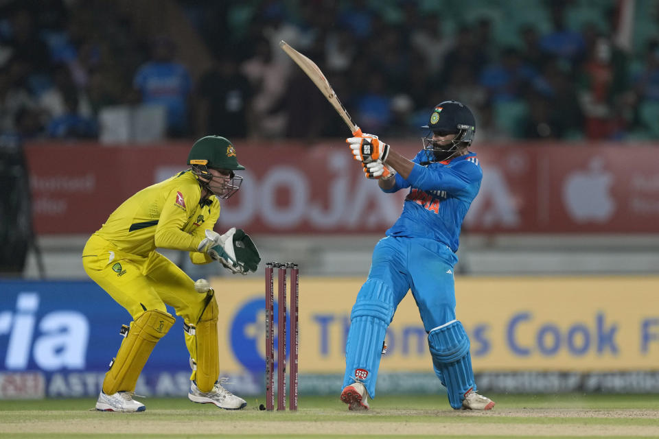 India's Ravindra Jadeja plays a shot during the third one day international cricket match between Australia and India in Rajkot, India, Wednesday, Sept. 27, 2023. (AP Photo/Ajit Solanki)