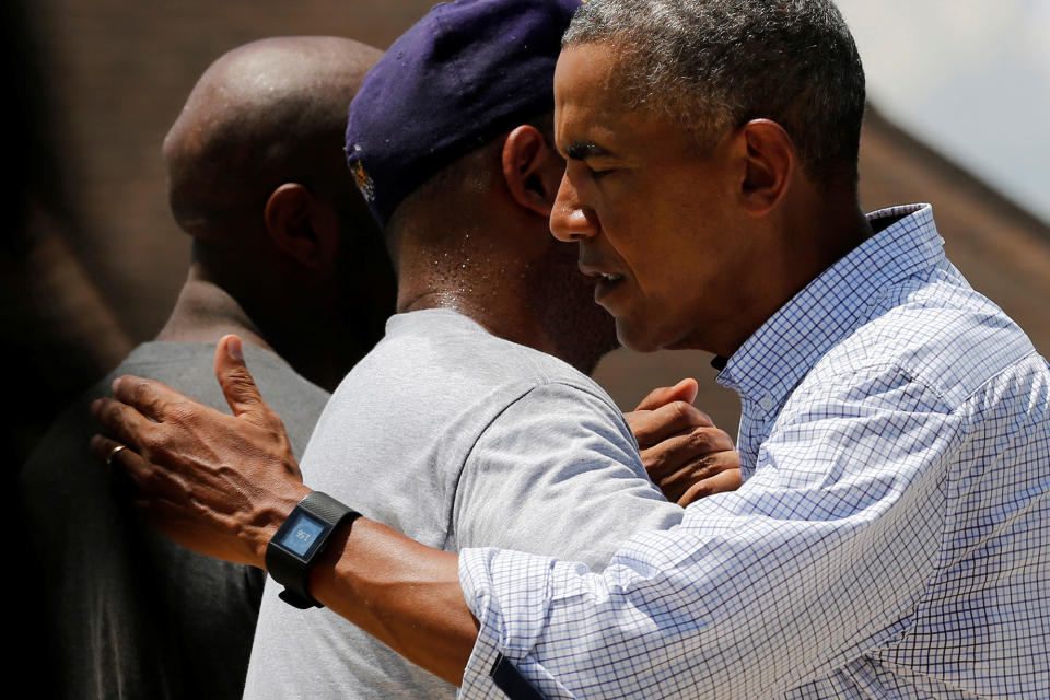 <p>President Barack Obama greets a resident as he tours a flood-affected neighborhood in Zachary, La., Aug. 23, 2016. (Photo: Jonathan Ernst/Reuters) </p>