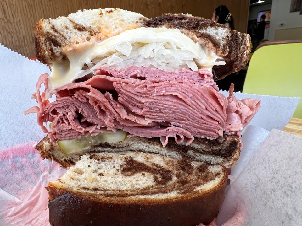It's hard to argue with the Reuben at Hansen's Manhattan Deli with its stack of corned beef on rye.
