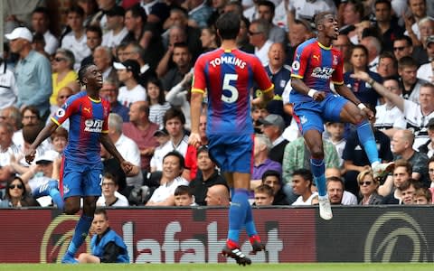 Wilfried Zaha of Crystal Palace celebrates after scoring his team's second goal during the Premier League match between Fulham FC and Crystal Palace at Craven Cottage on August 11, 2018 in London, United Kingdom - Credit: Getty Images 