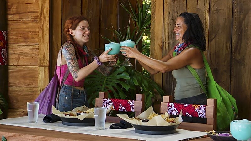 Kenzie and Maria drinking Applebee's margaritas.