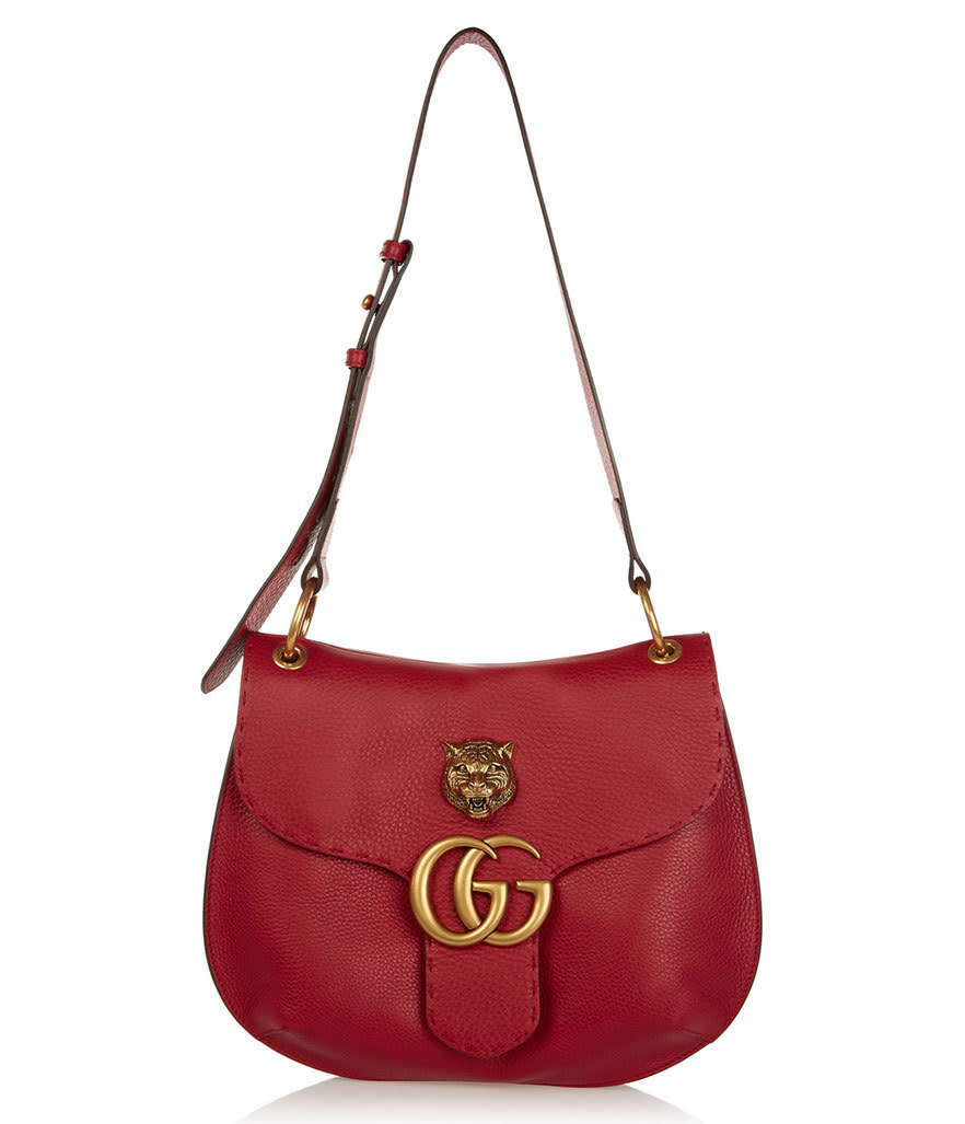 <p>Gucci GG Marmont Textured-Leather Shoulder Bag, $2,590, <a href="http://www.net-a-porter.com/us/en/product/643418/gucci/gg-marmont-textured-leather-shoulder-bag" rel="nofollow noopener" target="_blank" data-ylk="slk:net-a-porter.com;elm:context_link;itc:0;sec:content-canvas" class="link ">net-a-porter.com</a></p>