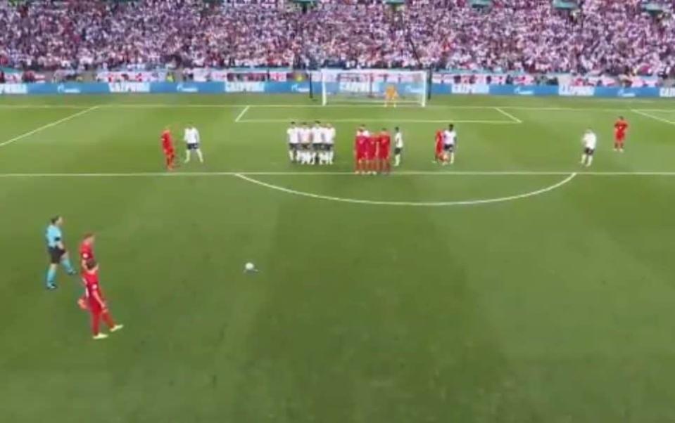 Screengrab shows Denmark's players approaching England's wall - ITV/UEFA