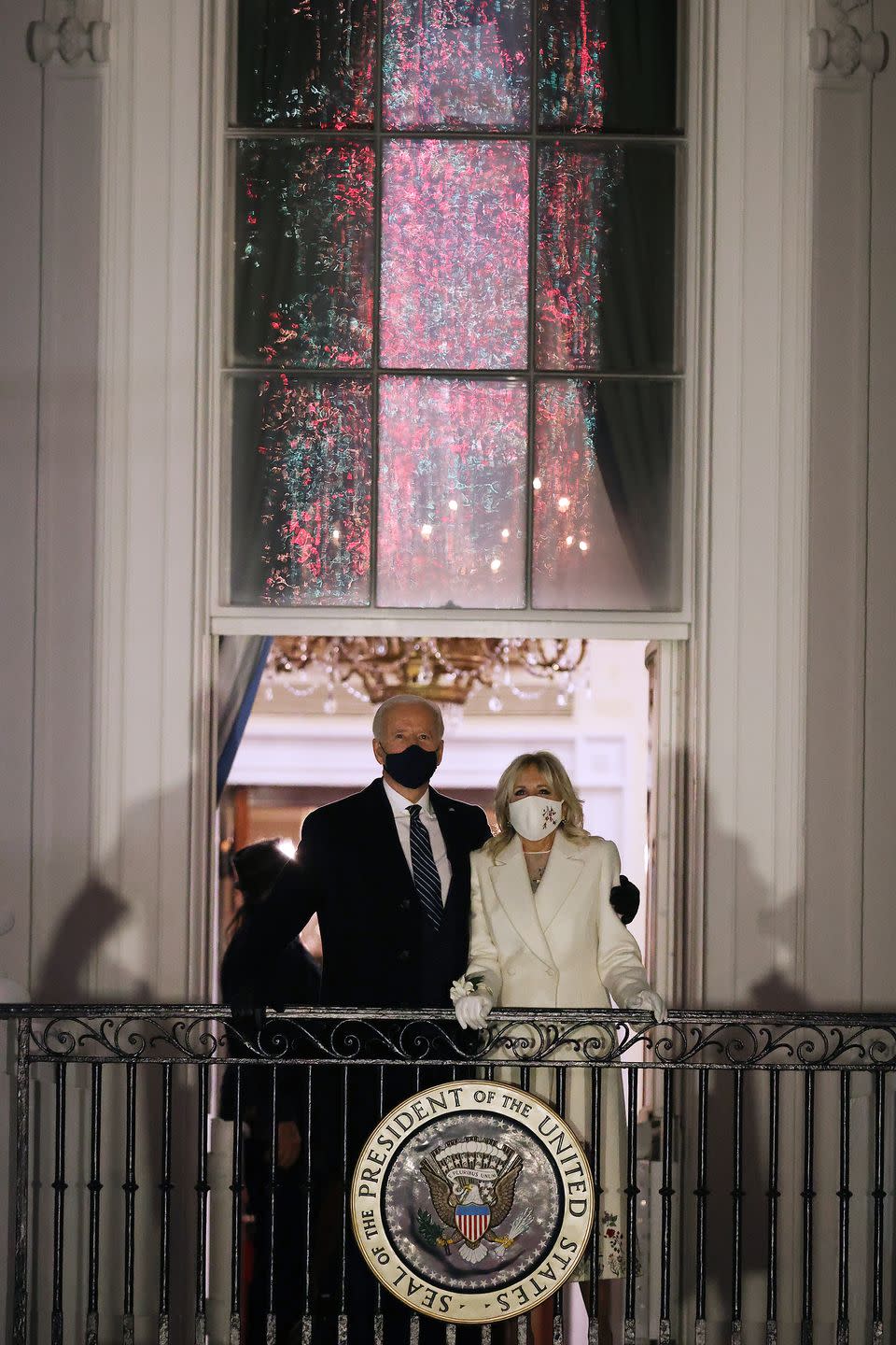 <p>Joe and Jill Biden watched the firework ceremony, with Jill wrapping up in a chic white coat. </p>