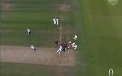 Smith lies injured on the ground - Credit: SKY SPORTS