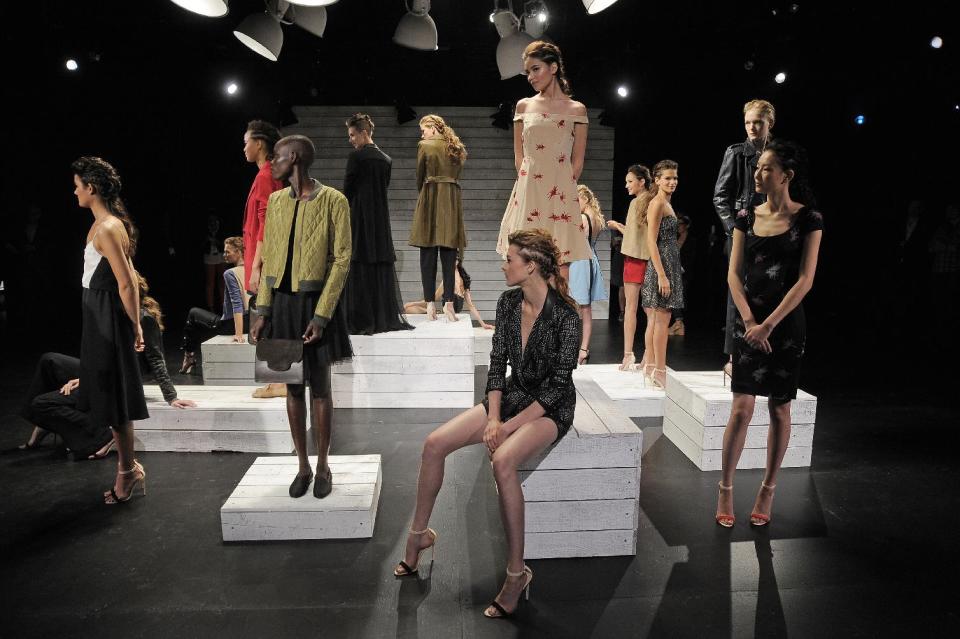 In this photo provided by Holmes & Yang, the Holmes & Yang Spring 2013 collection is modeled during Fashion Week in New York, Tuesday, Sept. 11, 2012. (AP Photo/Holmes & Yang, Dan Ashby)