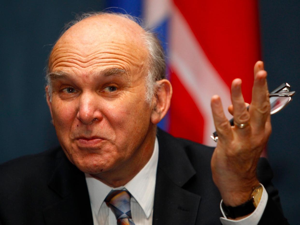 Britain's Business Secretary Vince Cable addresses the audience during an inter-government business commission meeting in Moscow November 26, 2010. Major Russian banks are considering buying stakes in British financial companies, Russia's Finance Minister Alexei Kudrin said on Friday.