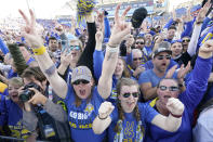 CORRECTS TO NORTH DAKOTA STATE NOT NORTH DAKOTA - South Dakota State fans celebrate on the filed after their team defeated North Dakota State to win the FCS Championship NCAA college football game, Sunday, Jan. 8, 2023, in Frisco, Texas. (AP Photo/LM Otero)